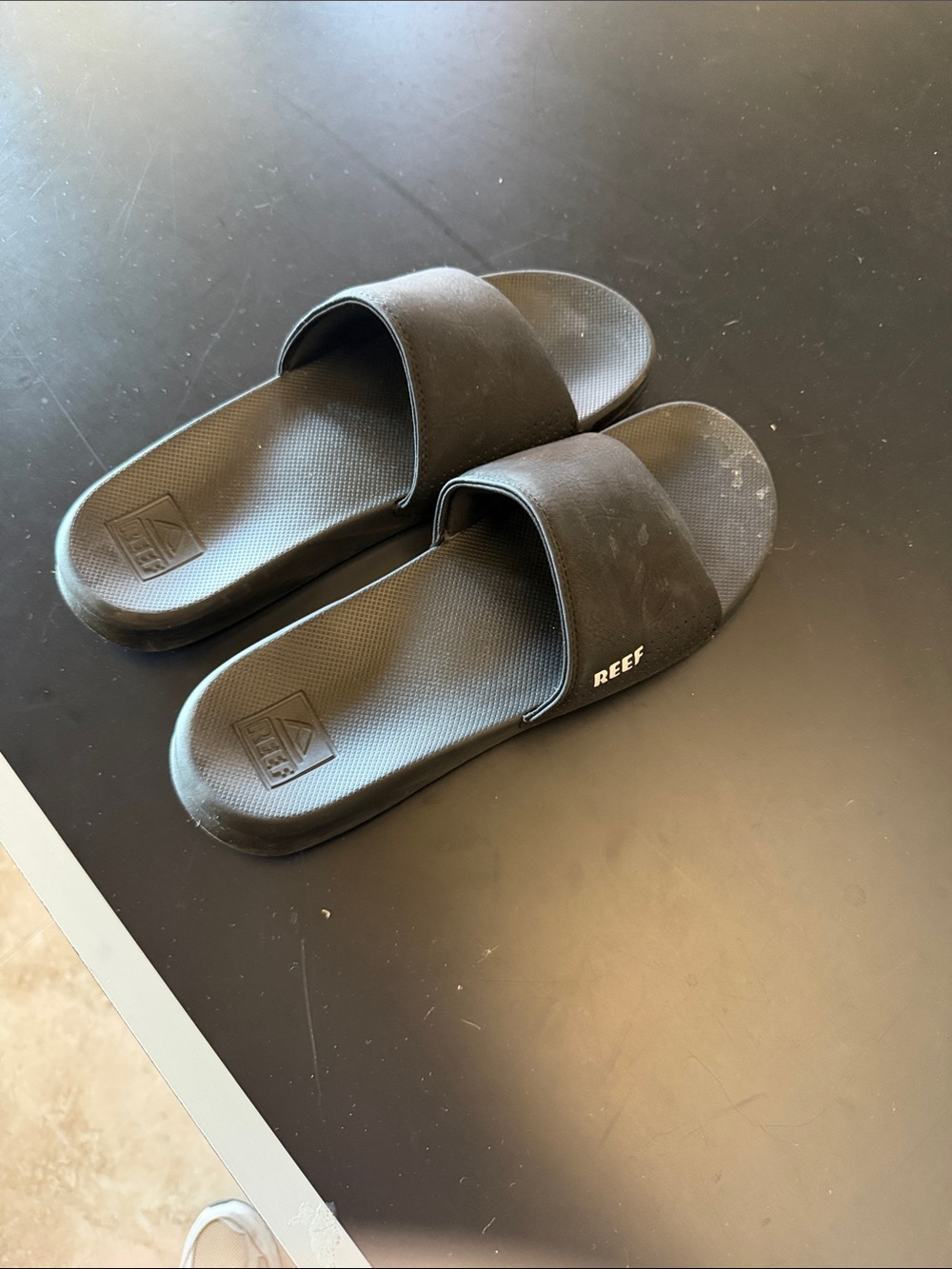 Reef Black Slide Sandals with White Logo